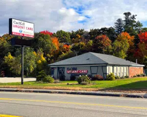 CareWell Urgent Care building with a sign on the side of the road in Fitchburg