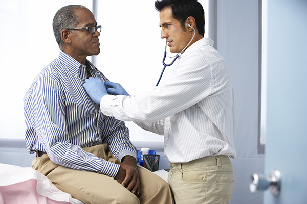 Dr performing physical exam